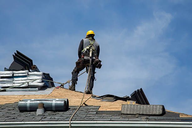 Professional Roofing technician working in Ballico, CA